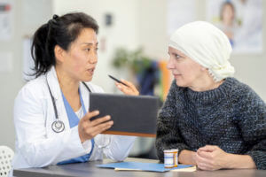 woman with cancer test meeting with a physician